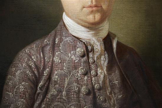 18th century English School Portrait of a gentleman wearing an embroidered silk jacket, 30 x 25in.